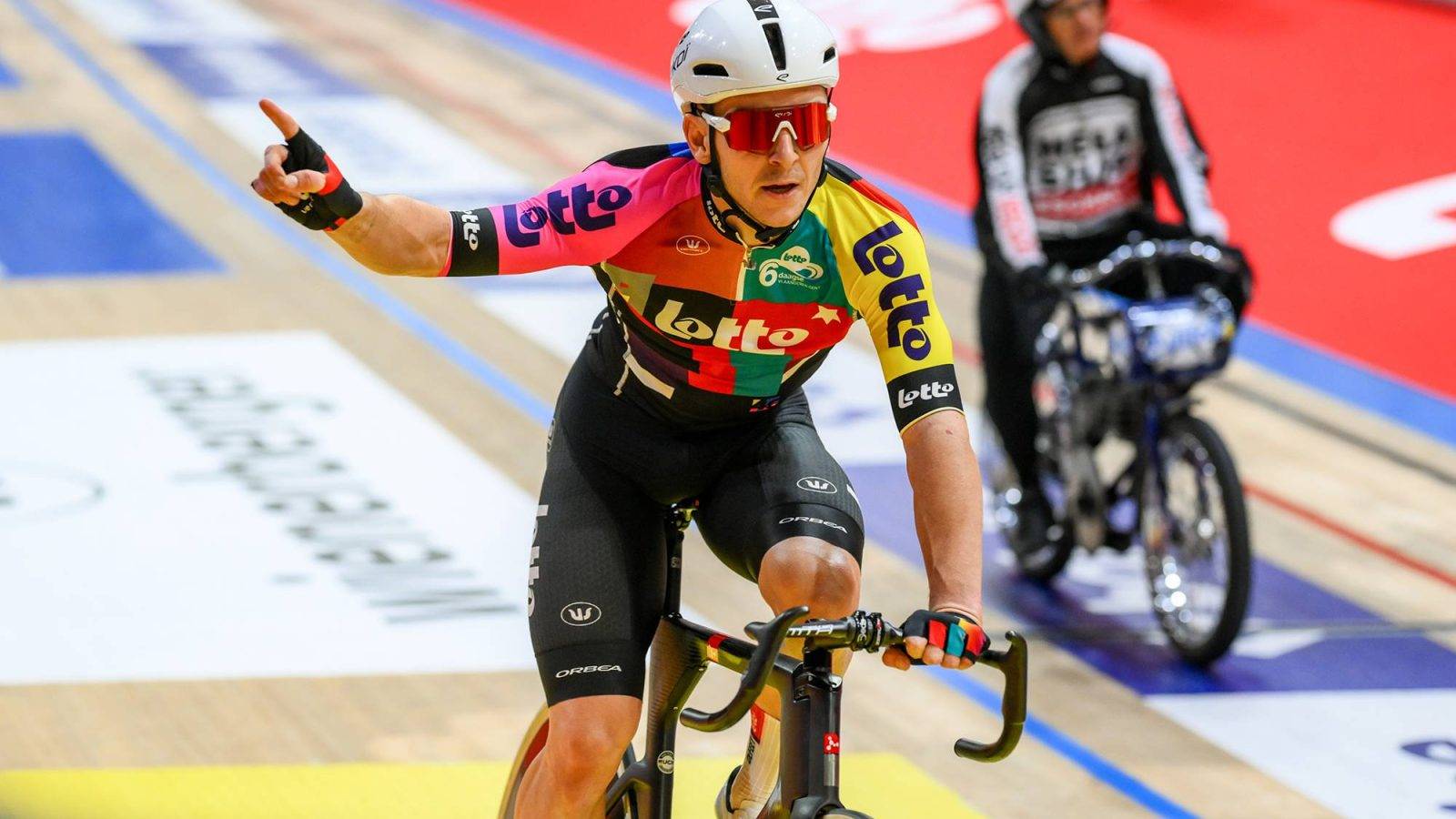 Belgian Jasper De Buyst celebrates during the first day of the Zesdaagse Vlaanderen-Gent six-day indoor track cycling event at the indoor cycling arena 't Kuipke, Tuesday 18 November 2025, in Gent. BELGA PHOTO DAVID PINTENS